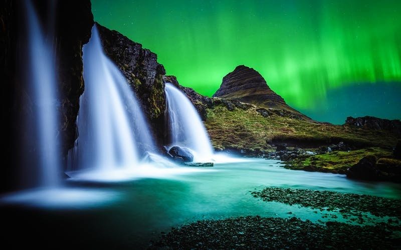 Northern lights over Kirkjufell mountain in Iceland